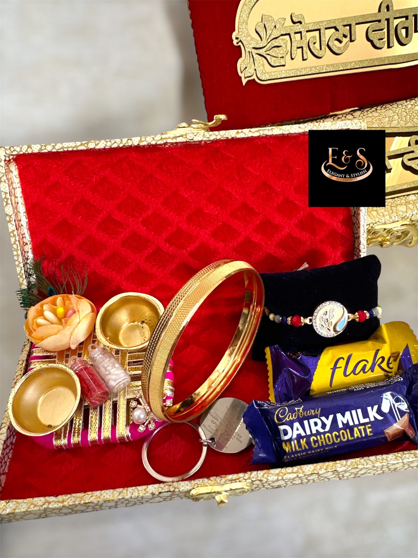 Premium Velvet Hamper box for brother - Includes ( Assorted Rakhi, Key chain, chocolates, Gold Plated Kada & roli chawal Trey)) Hamper Box 7