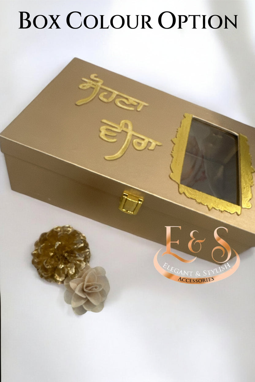 Gold jewelry box with decorative elements on a white background